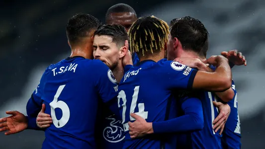 Chelsea players celebrate after scoring the opening goal during the English Premier League soccer match between Tottenham and Chelsea