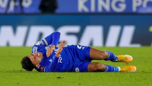 James Justin (2) of Leicester City is down injured during the FA Cup 5th round match between Leicester City and Brighton and Hove Albion at the King Power Stadium