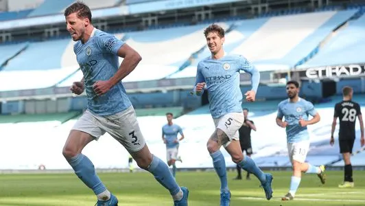 Ruben Dias of Manchester City celebrates scoring the 1st goal with John Stones