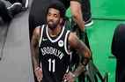Boston Celtics Kyrie Irving Thrown Water by a Fan