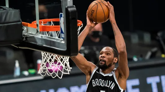 Kevin Durant dunks during the first-round playoff series between the Brooklyn Nets and the Boston Celtics, Saturday, May 22, 2021, New York