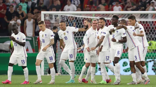 France players celebrate after scoring their second goal during the Euro 2020 soccer championship group F match between Portugal and France at the Puskas Arena in Budapest