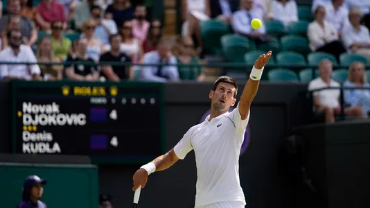 Novak Djokovic serves to Denis Kudla during the men's singles third round match on day five of the Wimbledon Tennis Championships in London, Friday July 2, 2021.