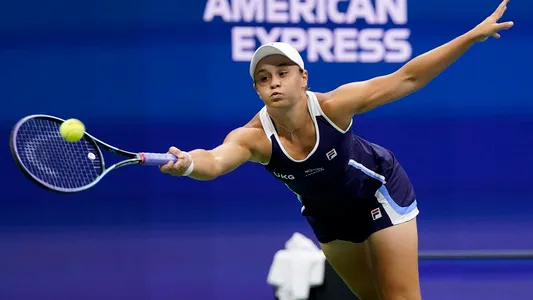 Ashleigh Barty returns a shot to Shelby Rogers during the third round of the US Open tennis championships, Saturday, Sept. 4, 2021, in New York.