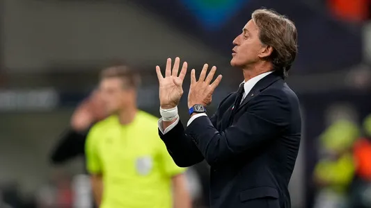 Italy's manager Roberto Mancini gestures during the UEFA Nations League semifinal soccer match between Italy and Spain at the San Siro stadium