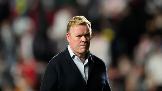Barcelona's head coach Ronald Koeman heads back down the tunnel at half time during a Spanish La Liga soccer match between Rayo Vallecano and FC Barcelona