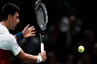 Djokovic Returns to Action Edging Fucsovics in Paris
