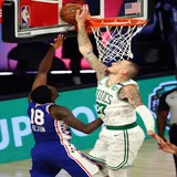 Daniel Theis (27) is called for goaltending a shot by Shake Milton (18) during a basketball game, Aug. 23, 2020