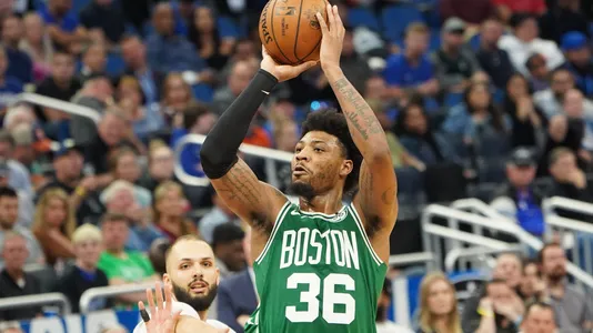 Boston Celtics player Marcus Smart shoots — Photo by headlinephotos