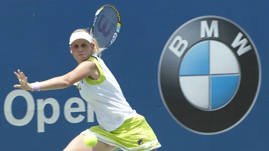 KUALA LUMPUR - MARCH 1: Jelena Dokic (AUS) return ball by forehand drive during match at BMW Malaysian Open 2012 in Kuala Lumpur Malaysia on March 1, 2012.