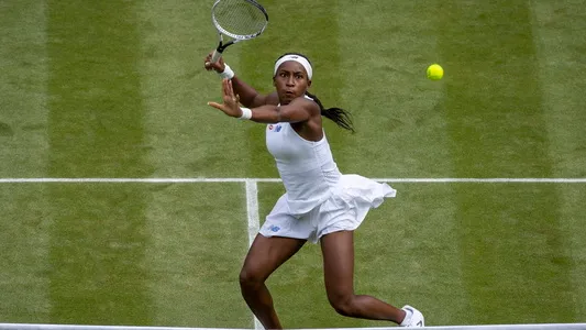 Coco Gauff in action against Angelique Kerber during the fourth round of the Ladies' Singles on Centre Court at The Championships 2021