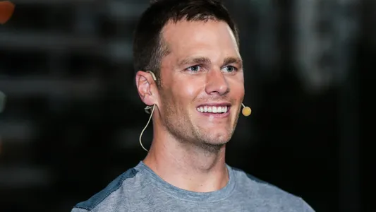 American football player Tom Brady for the New England Patriots of the National Football League (NFL) takes part in a football training camp in Shanghai, China, 20 June 2017. — Photo by ChinaImages