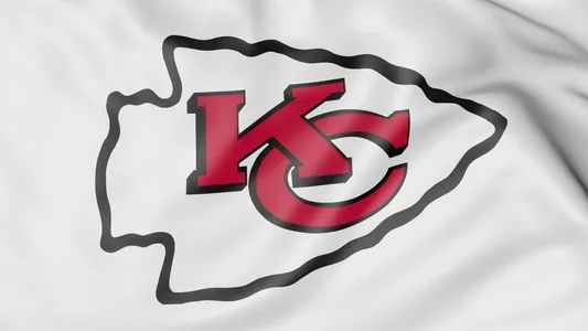 Close-up of waving flag with Kansas City Chiefs NFL American football team logo, United States — Photo by alexeynovikov