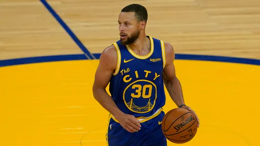 Stephen Curry dribbles against Utah Jazz during the second half of an NBA basketball game in San Francisco, Monday, May 10, 2021