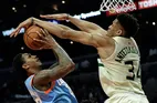 Williams saves Clippers and keeps playoff hopes alive