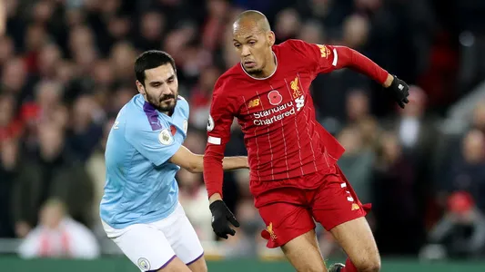Liverpool's Fabinho in action with Manchester City's Ilkay Gundogan