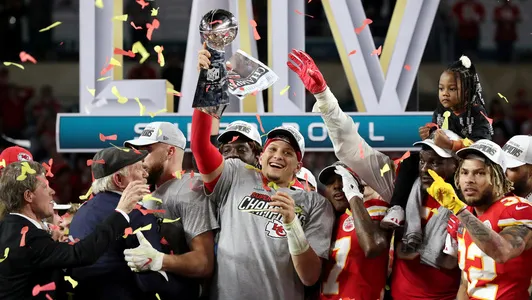 Kansas City Chiefs' Patrick Mahomes celebrates with the Vince Lombardi trophy after winning the Super Bowl LIV