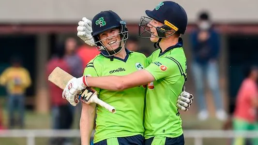 Ireland's Kevin O'Brien (L) and teammate Harry Tector celebrate after winning the third T20 between Afghanistan and Ireland