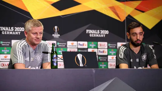 Ole Gunnar Solskjaer, Manager of Manchester United and Bruno Fernandes of Manchester United speak to the media during the Manchester United press conference