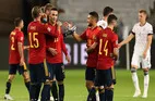 International Football Returns as Spain Level Late in Germany