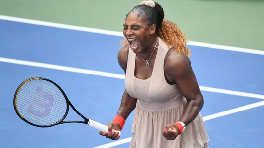 Serena Williams of the United States celebrates after match point against Maria Sakkari of Greece