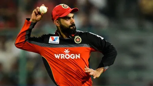 Royal Challengers Bangalore captain Virat Kohli throws the ball during the 2019 Indian Premier League