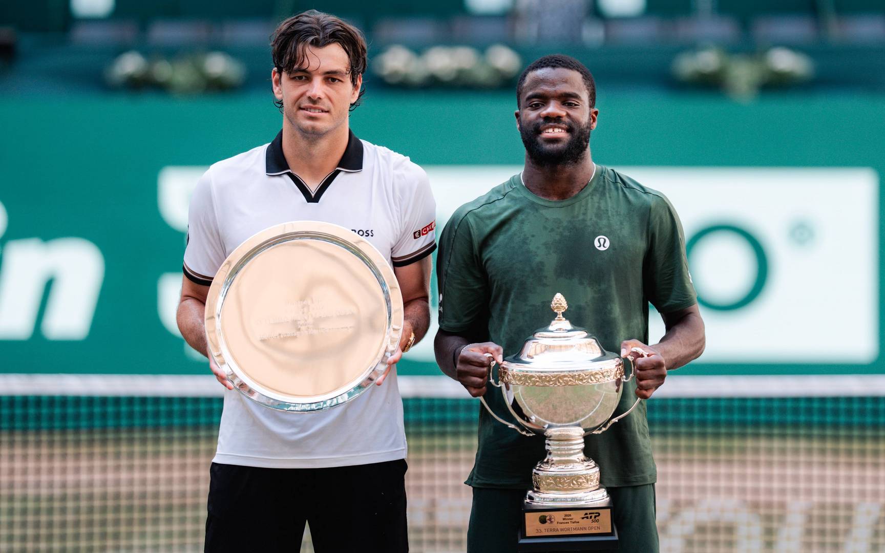 Taylor Fritz and Frances Tiafoe during the trophy presentation in Halle, Germany. June 21, 2026. Photo credit: TERRA WORTMANN OPEN / Alyssa van Heyst.